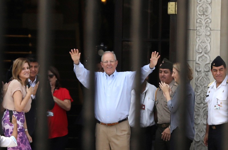 Pedro Pablo Kuczynski greets palace staff members after resignation, at the Government Palace in Lima