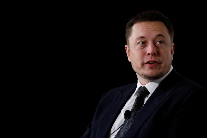 FILE PHOTO: Elon Musk, founder, CEO and lead designer at SpaceX and co-founder of Tesla, speaks at the International Space Station Research and Development Conference in Washington