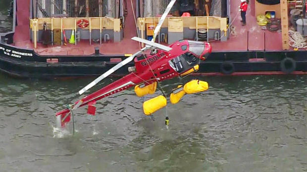 Scrutiny turns to harnesses inside chopper that crashed in New York City