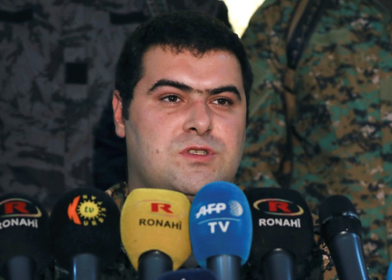 SDF spokesman Kino Gabriel speaks during a news conference in Ain Issa