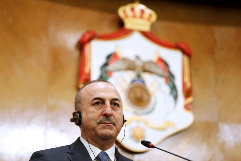 Turkish Foreign Minister Mevlut Cavusoglu, speaks during a news conference with his Jordanian counterpart Ayman Safadi in Amman