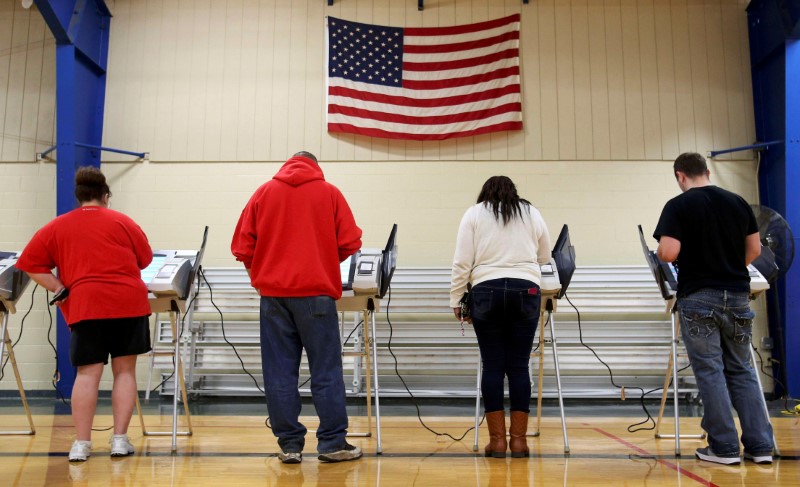 Voters cast their votes during the U.S. presidential election in Ohio