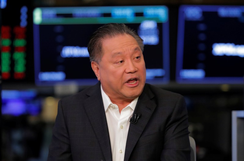 Hock Tan, CEO of Broadcom, speaks on the floor of the New York Stock Exchange shortly before the opening bell in New York