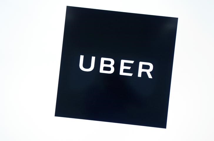 FILE PHOTO - Uber's logo is pictured at its office in Tokyo
