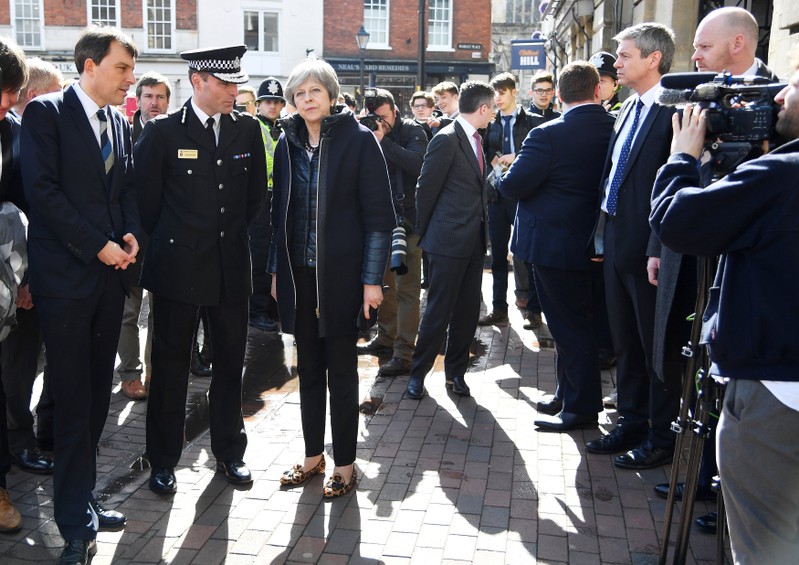 Britain's Prime Minister Theresa May visits the city where former Russian intelligence officer Sergei Skripal and his daughter Yulia were poisoned with a nerve agent, in Salisbury
