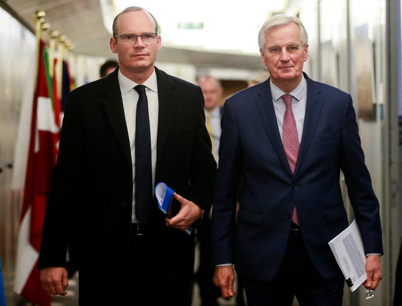 Ireland's Foreign Minister Coveney and EU's chief Brexit negotiator Barnier arrive for a meeting in Brussels