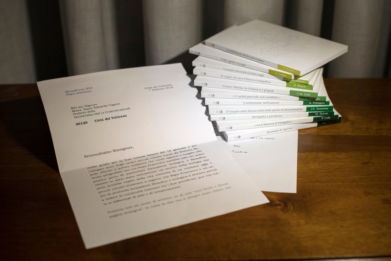 A series of 11 booklets on The Theology of Pope Francis and a letter from former Pope Benedict, which was read out at the presentation of the work, are seen at the Vatican