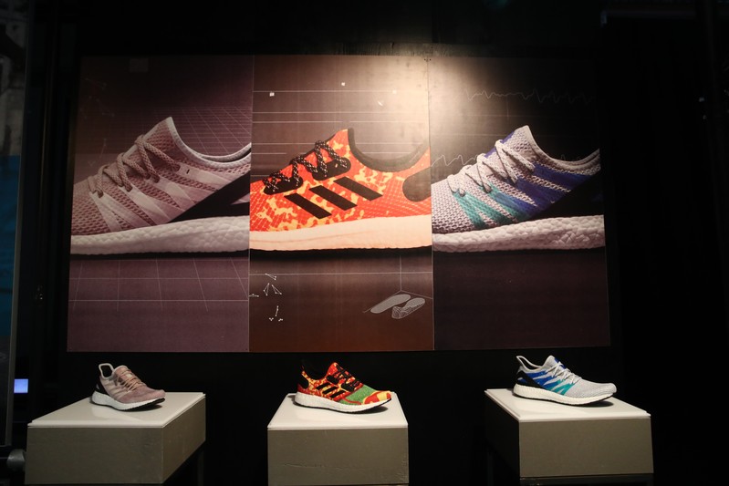 Adidas sport shoes are seen before the company's annual news conference in Herzogenaurach