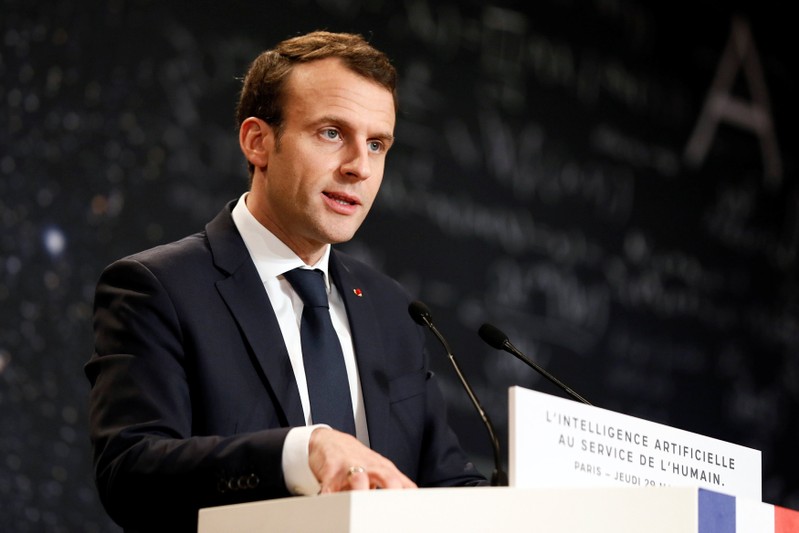 French President Emmanuel Macron delivers a speech during the Artificial Intelligence for Humanity event in Paris