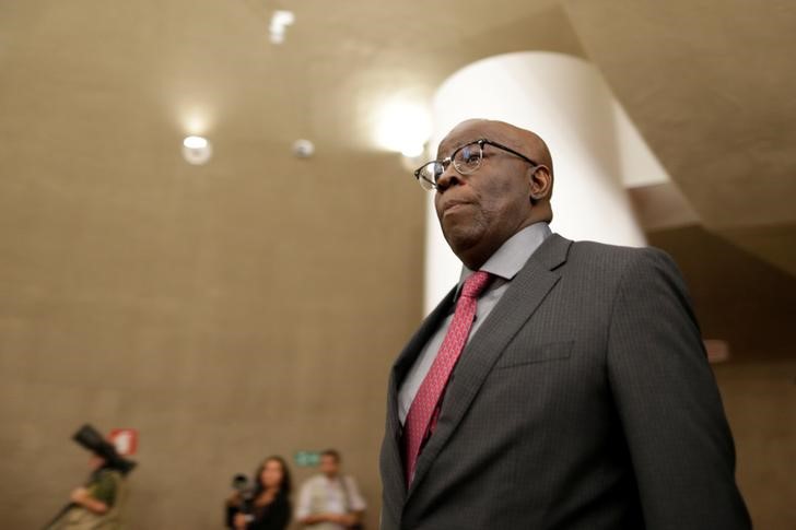 FILE PHOTO - Joaquim Barbosa, former minister of the supreme court of Brazil, is seen on arrival during a session where Brazil's electoral court will take up 2014 case that could unseat President Michel Temer, in Brasilia