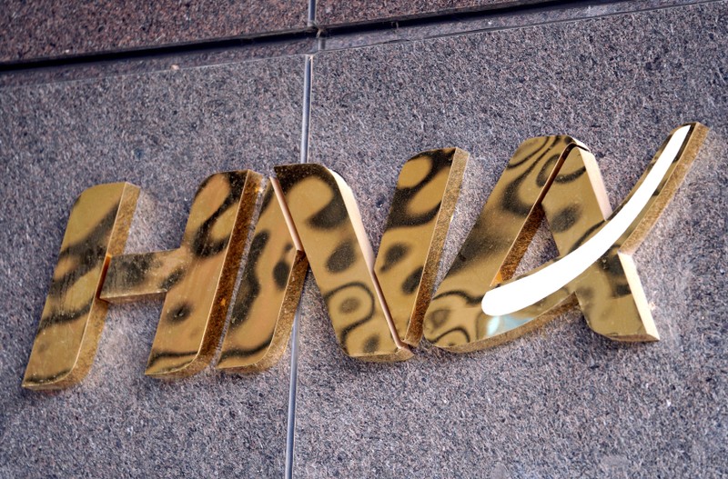 FILE PHOTO: A HNA Group logo is seen on the building of HNA Plaza in Beijing