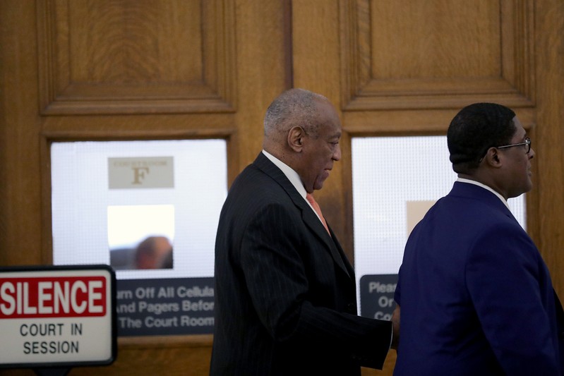 Actor and comedian Cosby, and Wyatt, leave the courtroom for a break during Cosby's second day of his sexual assault retrial in Norristown