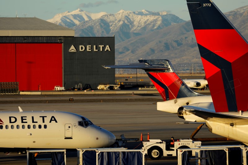 A Delta Air Lines flight is pushed put of its gate at the airport in Salt Lake City