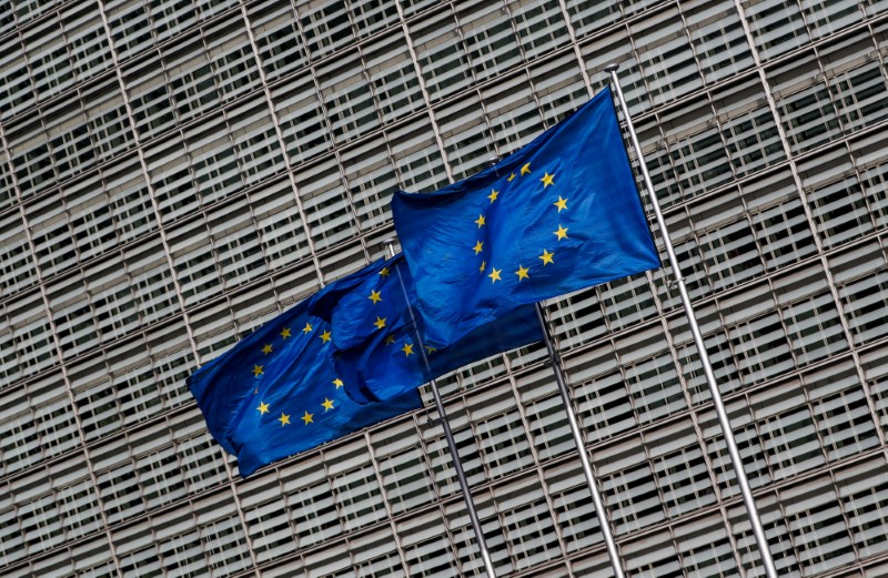 European Union flags flutter outside the EU Commission headquarters in Brussels