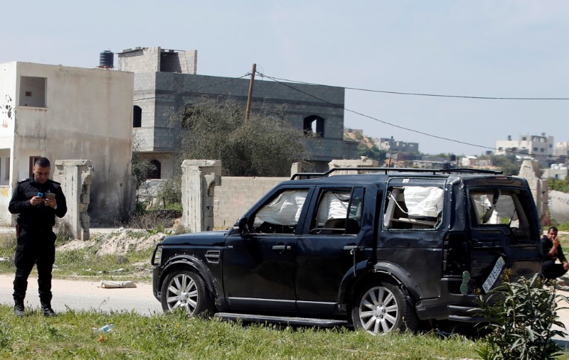 Damaged vehicle of the convoy of Palestinian Prime Minister Rami Hamdallah is seen after an explosion in the northern Gaza Strip