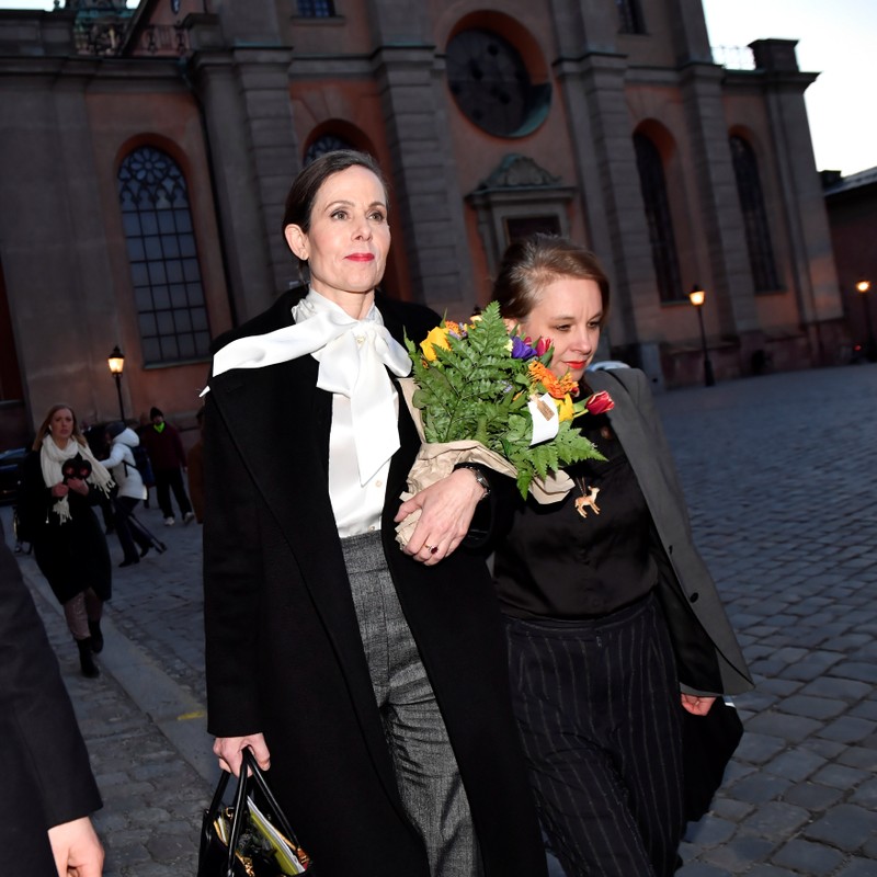 The Swedish Academy's Permanent Secretary Sara Danius and academy member Sara Stridsberg leave the Swedish Academy in Stockholm