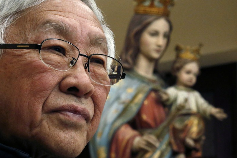 FILE PHOTO: Former head of the Catholic Church in Hong Kong, Cardinal Joseph Zen attends news conference in Hong Kong