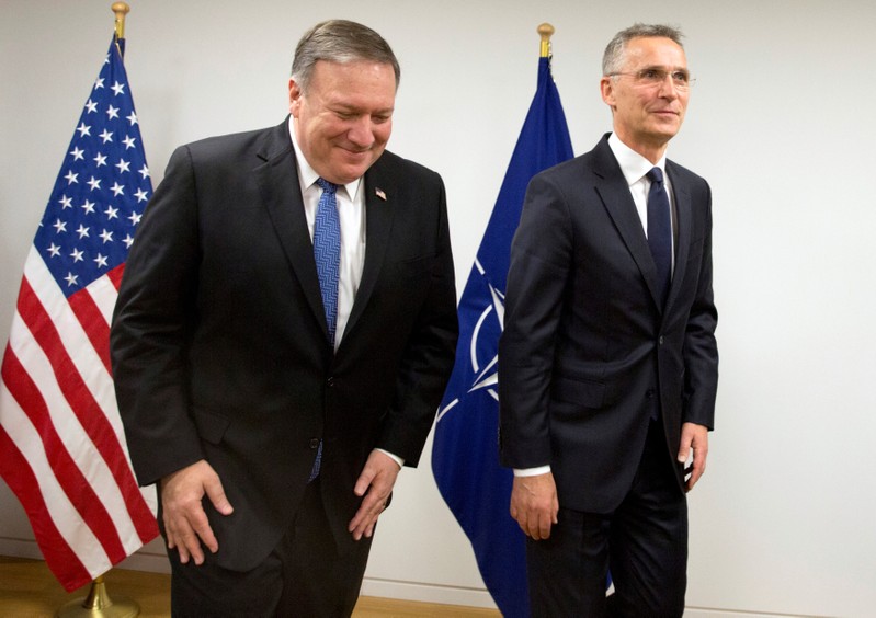 U.S. Secretary of State Mike Pompeo and NATO Secretary General Jens Stoltenberg attend a NATO foreign ministers meeting at the Alliance's headquarters in Brussels