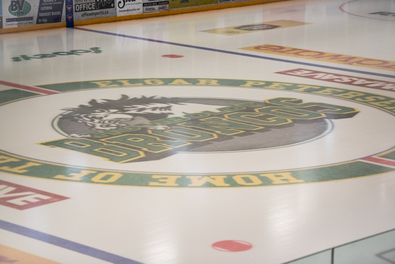 The Humboldt Broncos logo at centre ice at the Elgar Petersen Arena in Humboldt Saskatchewan