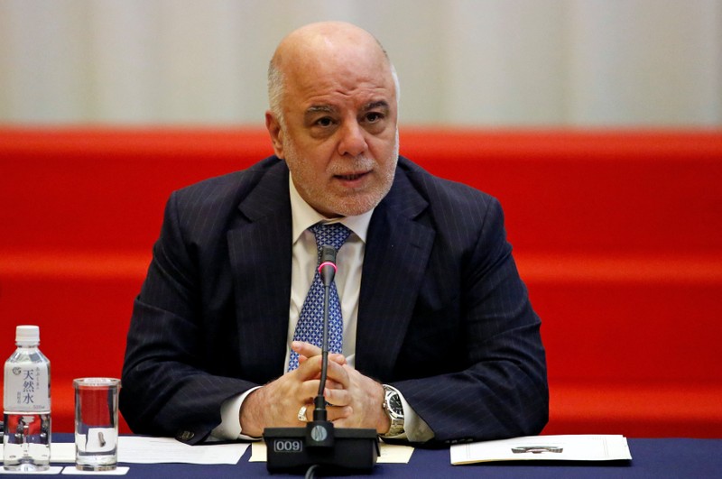 Iraqi PM Haider al-Abadi speaks during the Tokyo Conference on Supporting Job Creation and Vocational Training to Facilitate Weapons Reduction for Iraqi Society in Tokyo