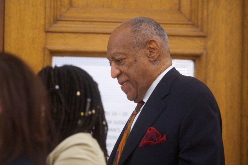 Actor and comedian Bill Cosby walks through the Montgomery County Courthouse during his sexual assault retrial in Norristown