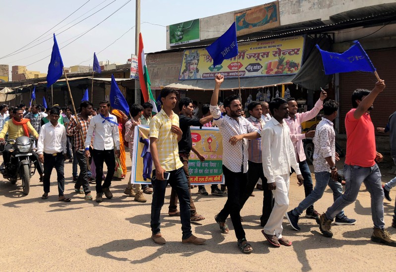 People belonging to the Dalit community shout slogans as they take part in a nationwide strike called by several Dalit organisations, in Kasba Bonli