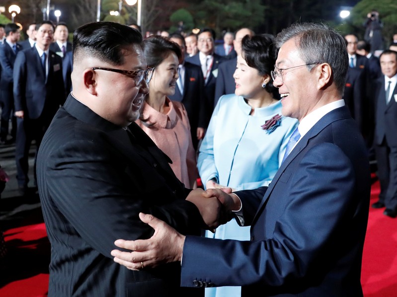 South Korean President Moon Jae-in, North Korean leader Kim Jong Un, Kim's wife Ri Sol Ju and Moon's wife Kim Jung-sook attend a farewell ceremony at the truce village of Panmunjom