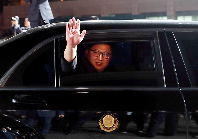 North Korean leader Kim Jong Un bids farewell to South Korean President Moon Jae-in as he leaves after a farewell ceremony at the truce village of Panmunjom