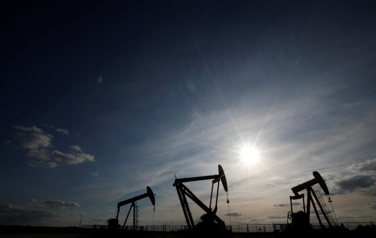 Oil prices inch down but gain support from Iran concerns