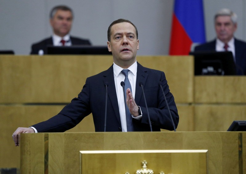 Russian Prime Minister Dmitry Medvedev delivers a speech during a session at the State Duma, the lower house of parliament, in Moscow