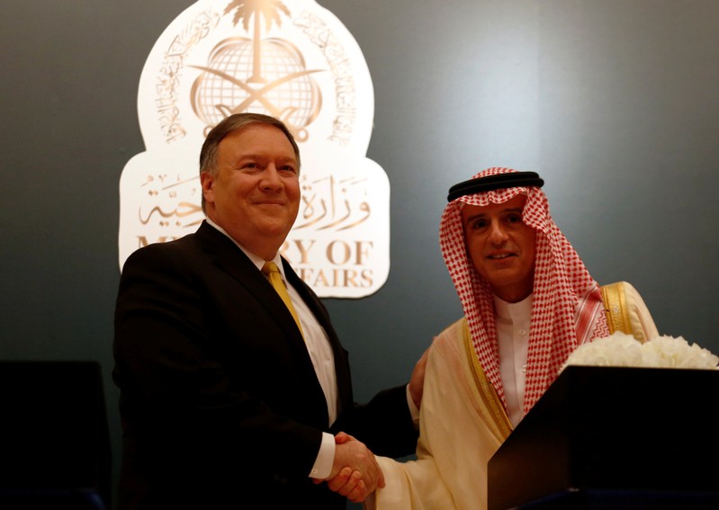 U.S. Secretary of State Mike Pompeo shakes hands with his Saudi counterpart Adel al-Jubeir during a news conference, in Riyadh