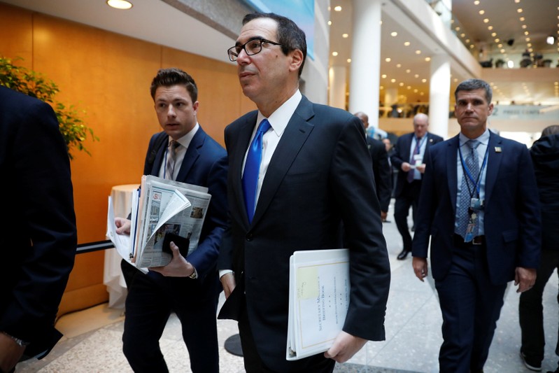 U.S. Secretary of the Treasury Mnuchin arrives for a G20 plenary session during IMF spring meetings in Washington