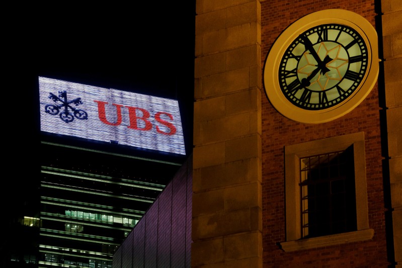 FILE PHOTO: A UBS advertisement is displayed on top of a commercial building in Hong Kong