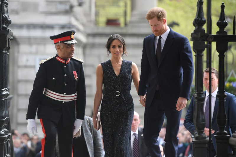 Britain's Prince Harry and his fiancee Meghan Markle arrive at a service at St Martin-in-The Fields to mark 25 years since Stephen Lawrence was killed in a racially motivated attack, in London