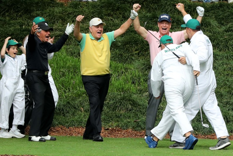 Nicklaus celebrates after his grandson made a hole-in-one during the par 3 contest at the 2018 Masters golf tournament in Augusta