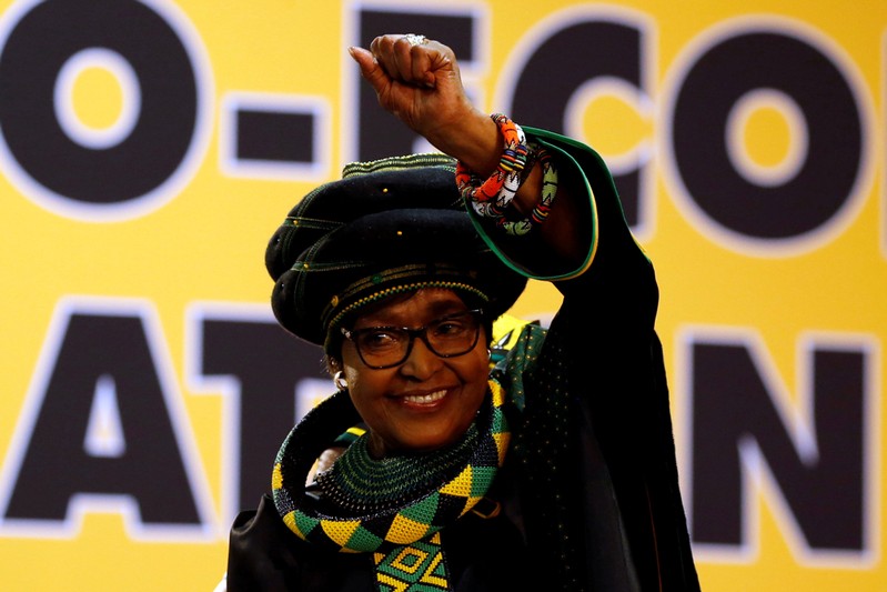 FILE PHOTO: Winnie Madikizela Mandela, ex-wife of former South African president Nelson Mandela, gestures to supporters at the 54th National Conference of the ruling African National Congress (ANC) at the Nasrec Expo Centre in Johannesburg