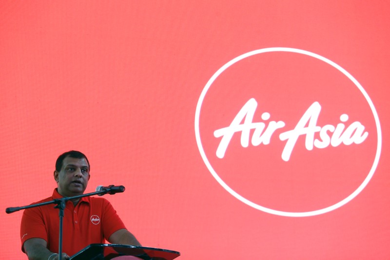 FILE PHOTO: AirAsia Group CEO Fernandes speaks during a news conference at AirAsia headquarters in Sepang