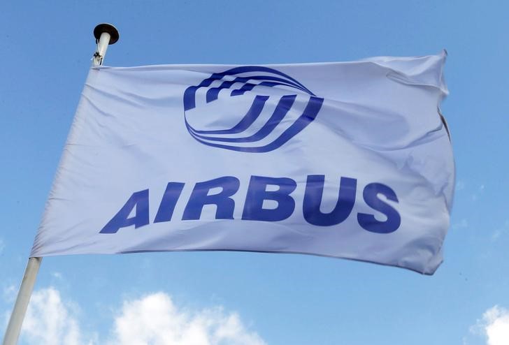 FILE PHOTO: Flag with Airbus logo is pictured at the Airbus A380 final assembly line at Airbus headquarters in Blagnac near Toulouse