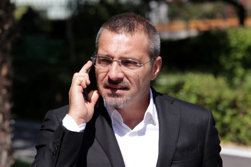 Former Albanian Interior minister Saimir Tahiri speaks on the phone in Tirana