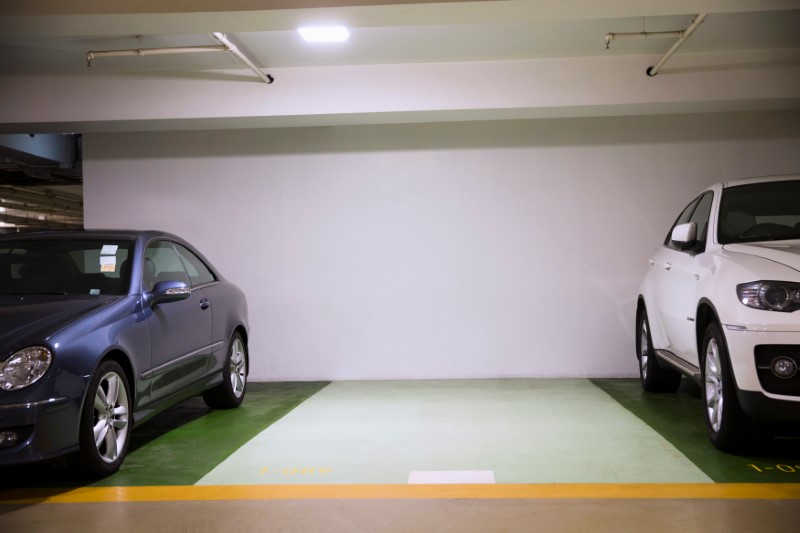 A car park, or 'grid', is seen in an underground parking garage in a luxury residential complex in Hong Kong
