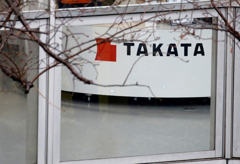 FILE PHOTO: Logo of Takata Corp is seen on its display at a showroom for vehicles in Tokyo