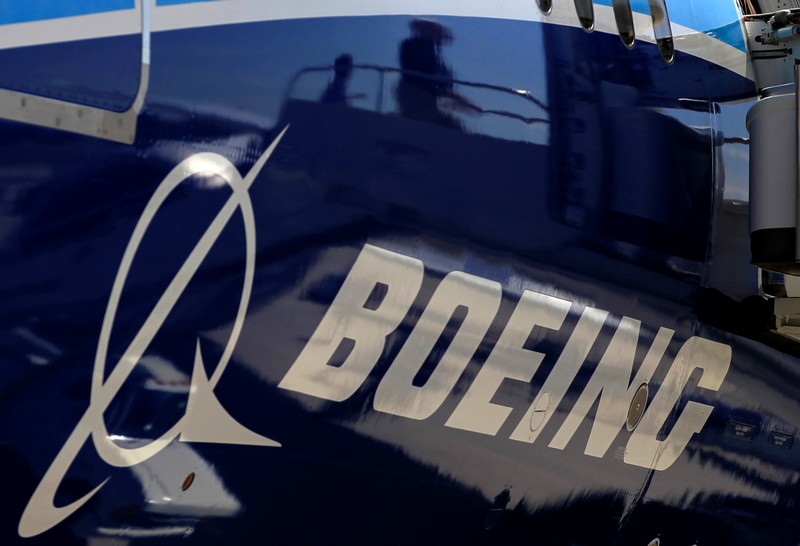 FILE PHOTO: The Boeing logo is seen on a Boeing 787 Dreamliner airplane in Long Beach