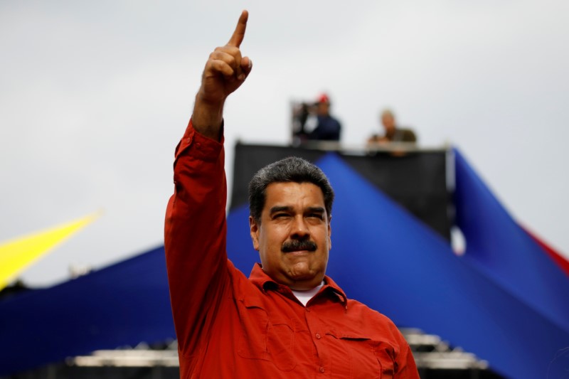 FILE PHOTO: Venezuela's President Nicolas Maduro gestures during a campaign rally in Caracas