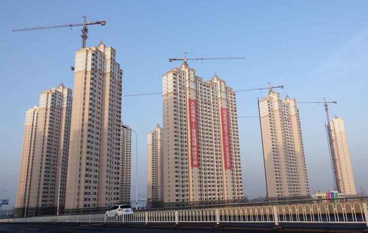 FILE PHOTO - Residential buildings under construction are seen in Jinpu New District in Dalian, Liaoning