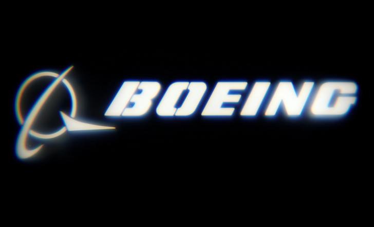 FILE PHOTO: The Boeing Company logo is projected on a wall at the 