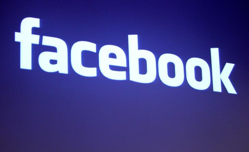 FILE PHOTO - The Facebook logo is shown at Facebook headquarters in Palo Alto