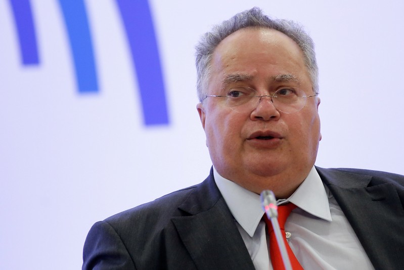 Greek Foreign Minister Nikos Kotzias speaks at a joint news conference with his Hungarian counterpart Peter Szijjarto (not pictured) during the 