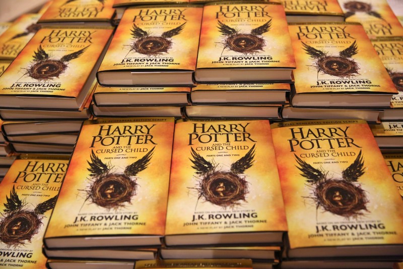 FILE PHOTO: Copies of the book of the play of Harry Potter and the Cursed Child parts One and Two are displayed at a bookstore in London
