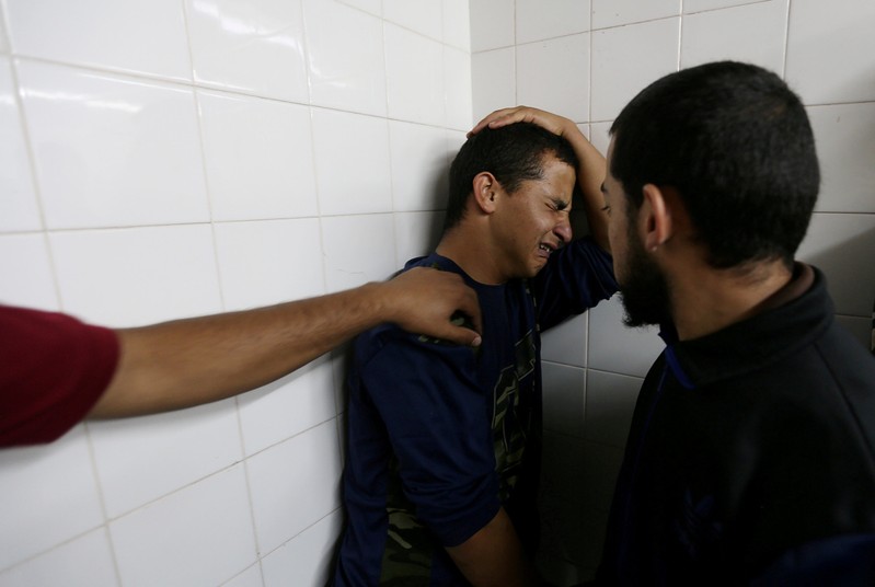 Relative of a Palestinian who was killed at the Israel-Gaza border reacts at a hospital, in the southern Gaza Strip