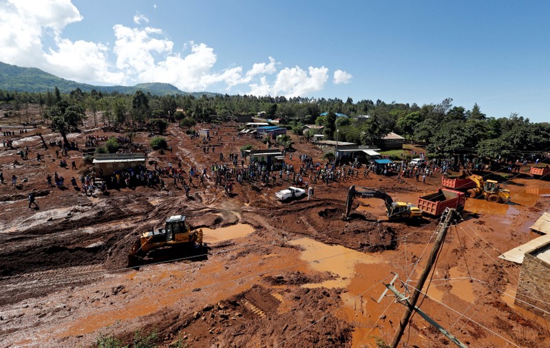 An aerial view of rescue efforts near destroyed houses by flooding water after a dam burst, in Solio town near Nakuru